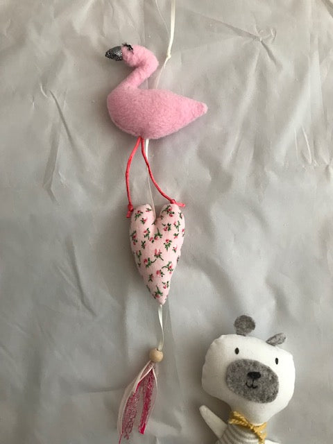 Flamingo and Heart hanging door gift with lace and a bead it is a perfect handmade unique gift for any baby nursery or children’s bedroom. Can be hung on a door or pinned to the wall.