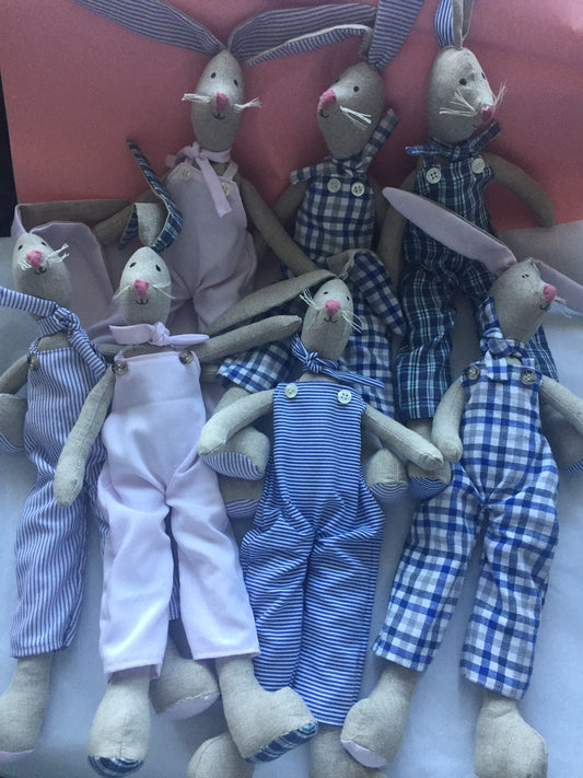 Linen Keepsake Rabbit that has dungarees made from a loved ones shirt. The ears and pads of their feet match its clothes and is a wonderful way to remember a loved one or a favourite piece of clothing. Great for children’s bedroom or nursery.
