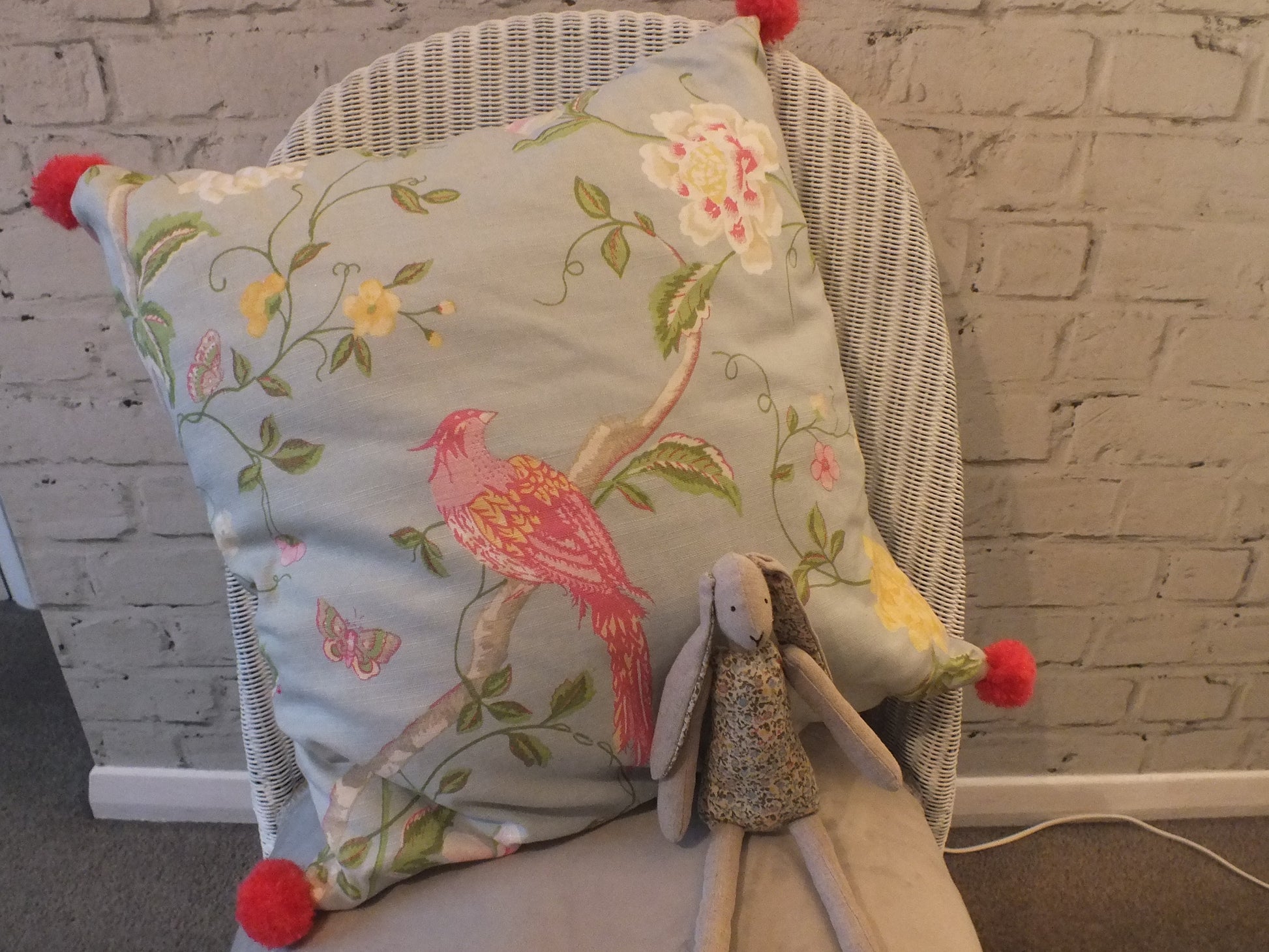 Handmade Laura Ashley Bird Cushion in a light blue green fabric . This lovely square cushion is perfect for children’s bedrooms.
