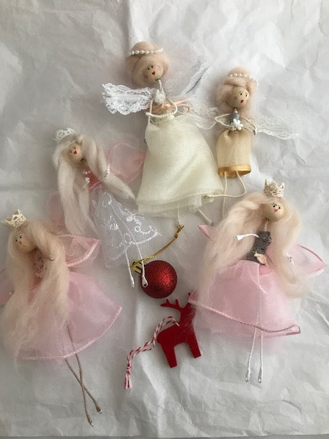 Fairy Christmas Tree hanging Decoration.  These super cute fairies are perfect for the placing on your Christmas Tree or on your fireplace! Wire, embroidery thread, wooden beads, real wool for their hair and pretty dresses or skirts.