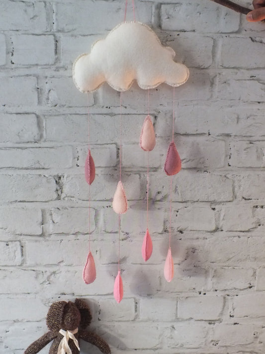 Felt Cloud and Raindrop Wall Hanging  perfect for a baby shower gift.  There are a choice of colours and have a sewn loop on one side for easy hanging, just pop onto the bedroom wall!