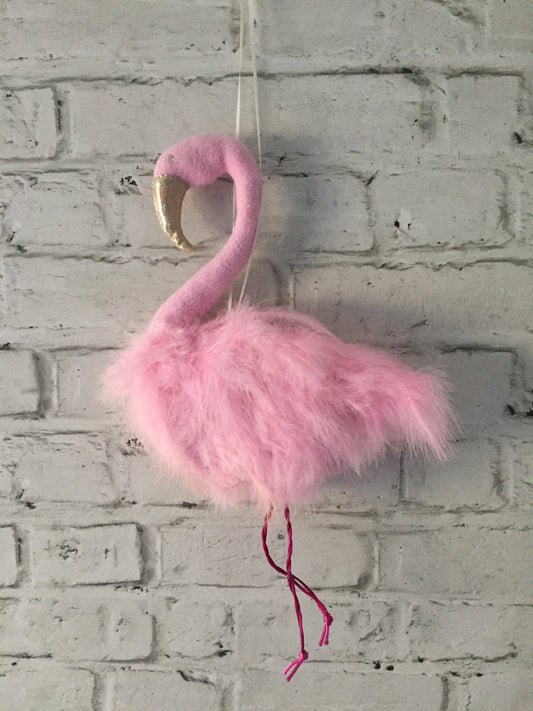 Large pink feather Flamingo Wall Hanging perfect for a baby shower gift. This lovely feathered padded flamingo has a ribbon hoop for easy hanging, a sparkly gold beak and long pink legs. Just pop a pin onto the bedroom wall and hang.